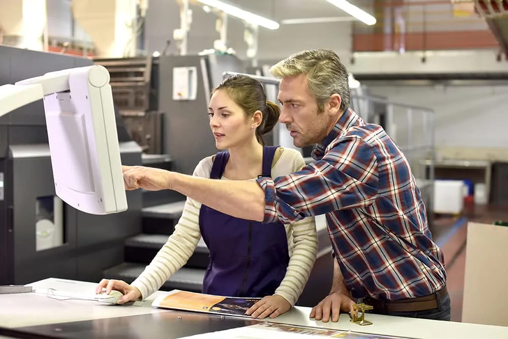 An apprentice working alongside a mentor